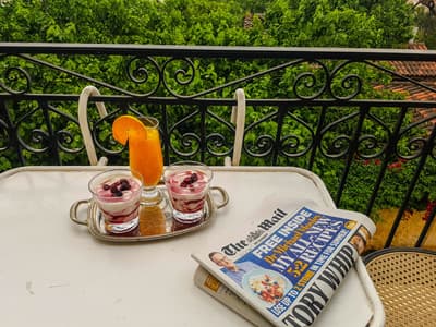 Breakfast laid out on a table in the hotel garden